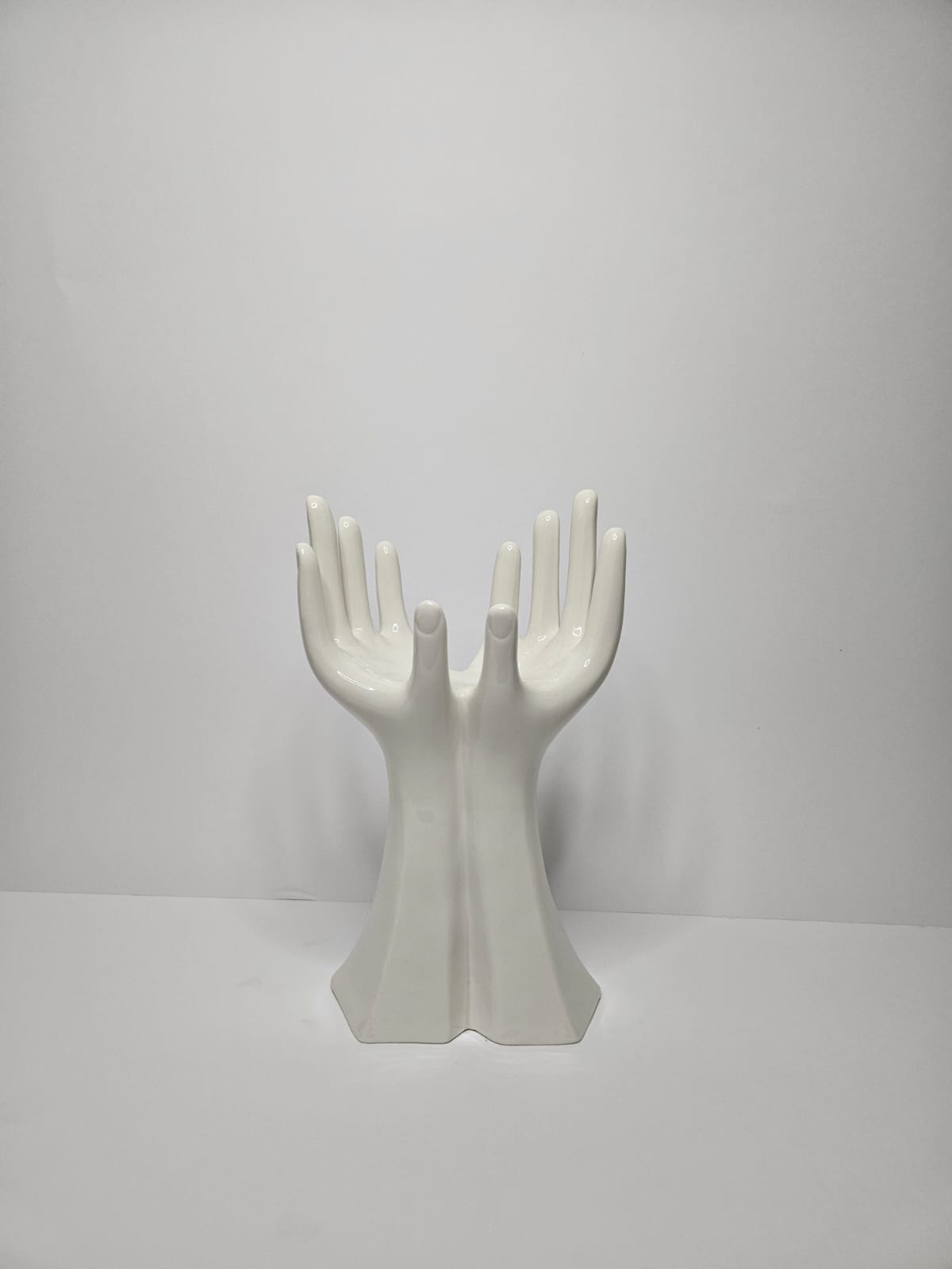 Scultura mano sorreggere